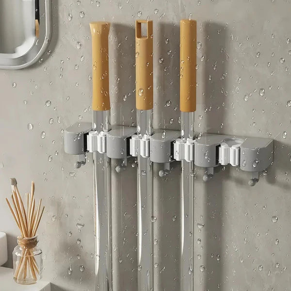 Wall-mounted mop and broom holder